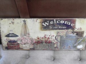 PLAQUE METAL 50X20CM WELCOME TO OUR HOME ANNEXE MEUBLE & DECO