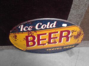 PLAQUE METAL OVALE L.56CM ICE COLD BEER ANNEXE MEUBLE & DECO